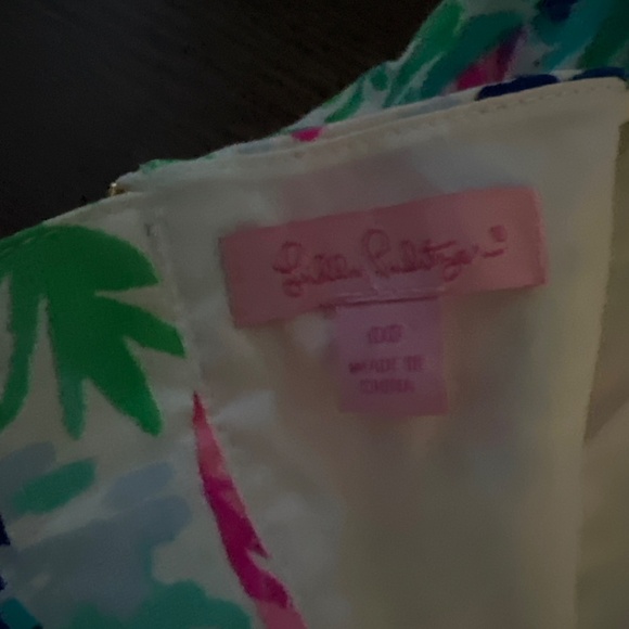 The image shows a Lilly Pulitzer Shelli Stretch Dress in a colorful, abstract pr - Picture 5 of 7